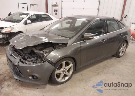 2014 Ford Focus Titanium from USA, damaged, VIN 1FADP3J27EL289596